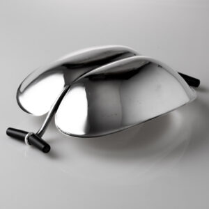 Tapio Wirkkala - A Sterling silver leafshaped dish, with lacquered wooden handles, model TW 58 - Kultakeskus, Finland 1956